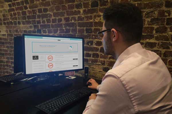 a young male using the eRiskology Information Security Awareness elearning portal